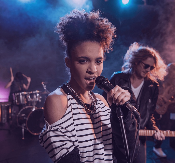 A woman singing in a nightclub